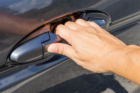 How to Open a Stuck Car Door: A Journey Through the Absurd and Practical